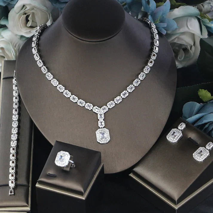 Ladies’ banquet party jewelry, elegant four-piece matching accessory set.