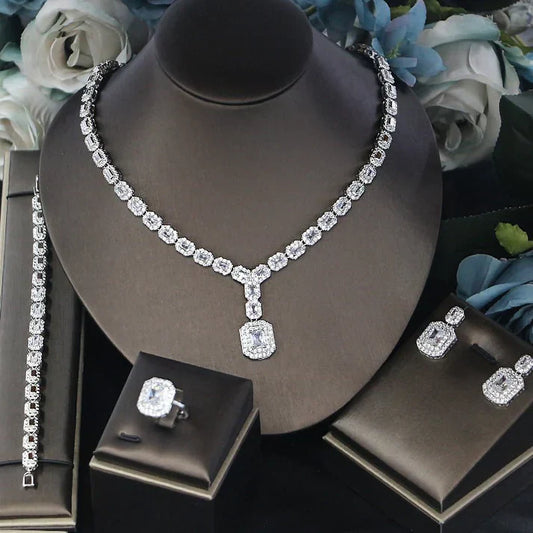 Ladies’ banquet party jewelry, elegant four-piece matching accessory set.
