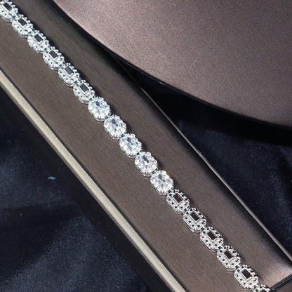 Ladies’ banquet party jewelry, elegant four-piece matching accessory set.