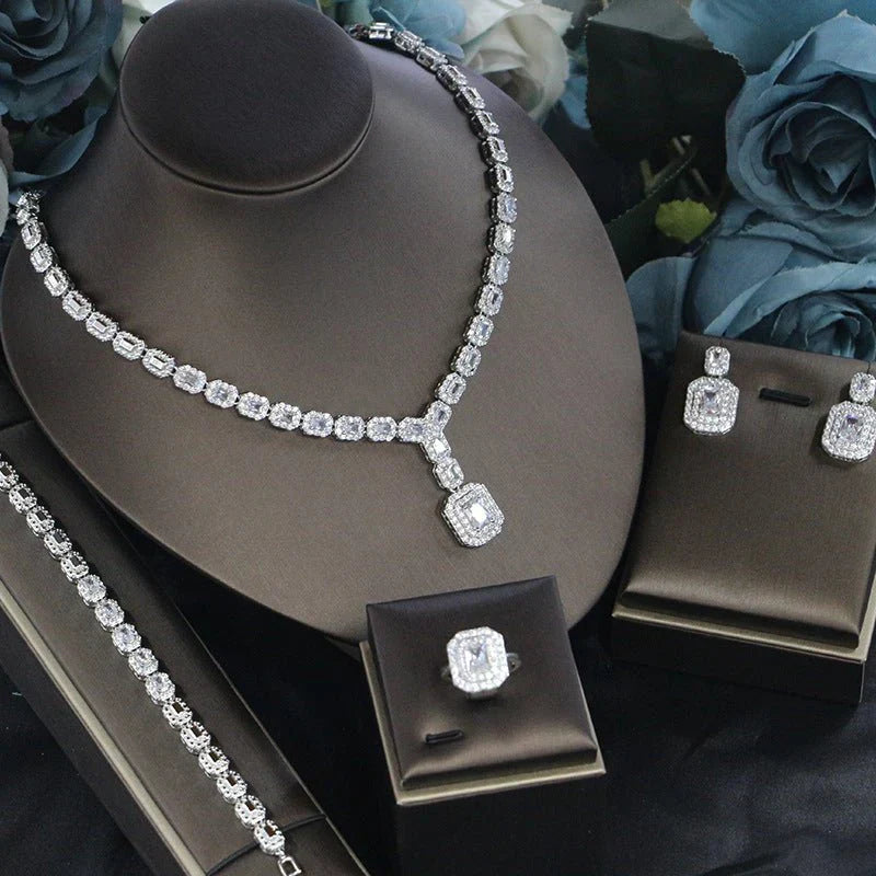 Ladies’ banquet party jewelry, elegant four-piece matching accessory set.